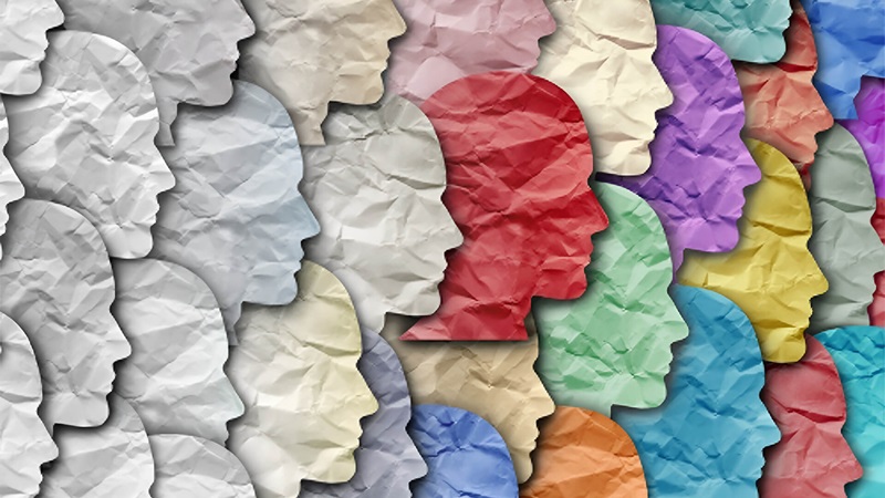 Collage of paper cut outs in shape of human head