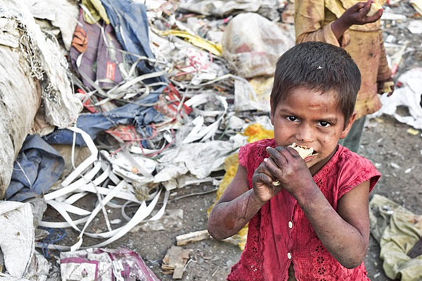 Hungry child eating